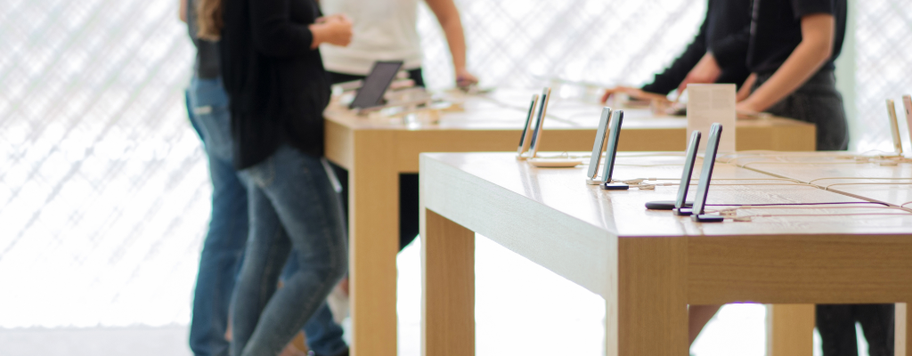 Customers in a cell phone store