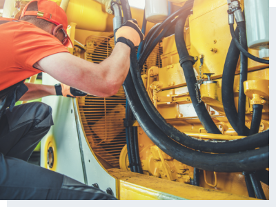 Bulldozer repair and maintenance A mechanic working on an HVAC